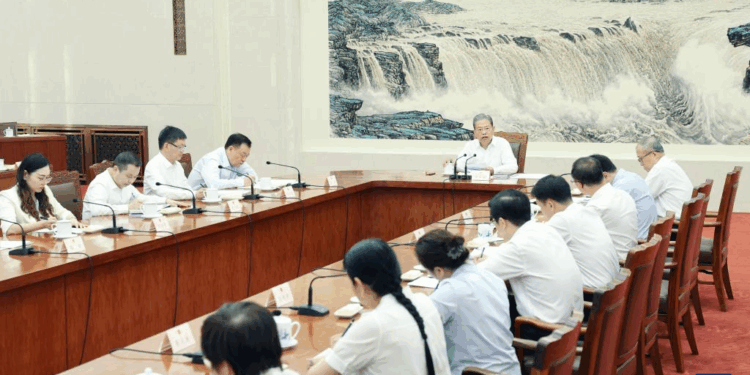 Zhao Leji, a member of the Standing Committee of the Political Bureau of the Communist Party of China Central Committee and chairman of the National People's Congress (NPC) Standing Committee, exchanges views with non-voting deputy attendees of the 16th session of the 14th NPC Standing Committee at a symposium on June 25, 2025. (Xinhua/Yao Dawei)