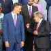 Spain’s Prime Minister Pedro Sanchez, left, speaks with United Nations Secretary-General Antonio Guterres, as they pose for a photo with nation leaders and representatives, at the start of the four-day Financing for Development meeting, in Seville, Spain, Monday, June 30, 2025. (AP Photo/Jose Angel Garcia)