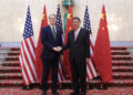 Chinese Vice Premier He Lifeng shakes hands with US Treasury Secretary Scott Bessent in London on Monday. Li Ying/Xinhua/Getty Images