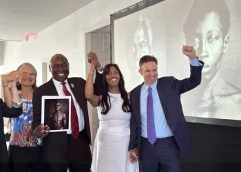 Susanna Moore, left, the great-great-great-granddaughter of Harvard biologist Louis Agassiz, celebrates with Tamara Lanier, second right, and attorneys Ben Crump and Josh Koskoff at the Boston Marriott Long Wharf hotel on Wednesday, March 28, 2025 in Boston, Mass. (AP Photo/Leah Willingham)