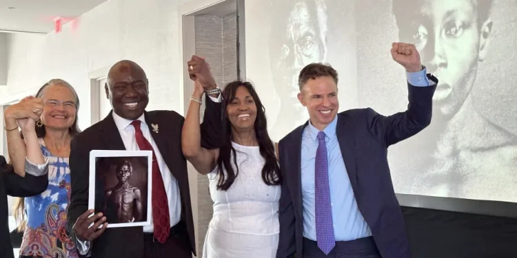 Susanna Moore, left, the great-great-great-granddaughter of Harvard biologist Louis Agassiz, celebrates with Tamara Lanier, second right, and attorneys Ben Crump and Josh Koskoff at the Boston Marriott Long Wharf hotel on Wednesday, March 28, 2025 in Boston, Mass. (AP Photo/Leah Willingham)