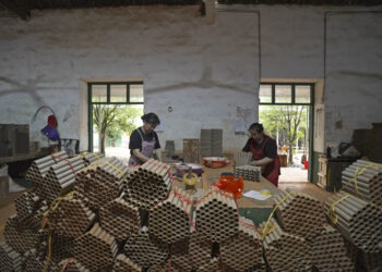 Workers making fireworks at a factory in Liuyang, China.Fred Dufour / NBC News