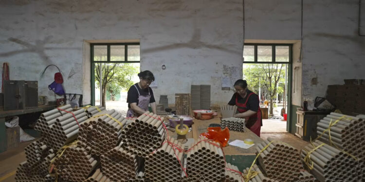 Workers making fireworks at a factory in Liuyang, China.Fred Dufour / NBC News