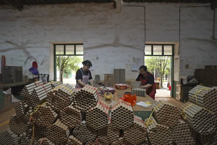 Workers making fireworks at a factory in Liuyang, China.Fred Dufour / NBC News