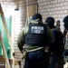 Immigration and Customs Enforcement officers wait to detain a person, Jan. 27, 2025, in Silver Spring, Md.Alex Brandon / AP file