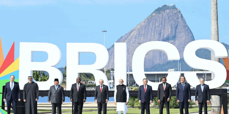 Leaders attending the plenary session on "Peace and Security and Reform of Global Governance" at the 17th BRICS Summit pose for a group photo in Rio de Janeiro, Brazil, July 6, 2025. /Xinhua