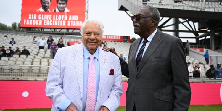 Farokh Engineer (left) and Sir Clive Lloyd share a moment in front of the newly re-named stand.
