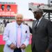 Farokh Engineer (left) and Sir Clive Lloyd share a moment in front of the newly re-named stand.