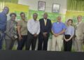 AFC leaders and members of the Carter Centre. AFC Leader Nigel Hughes in sut (centre)