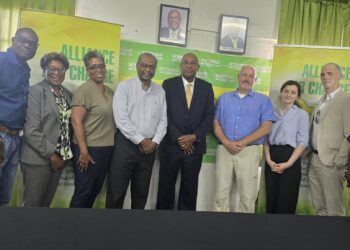 AFC leaders and members of the Carter Centre. AFC Leader Nigel Hughes in sut (centre)