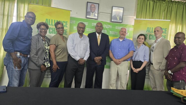 AFC leaders and members of the Carter Centre. AFC Leader Nigel Hughes in sut (centre)