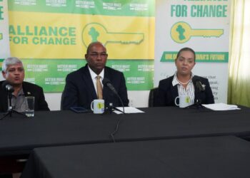 L-R Former minister Jaipaul Sharma, AFC Leader and Presidential Candidate Nigel Hughes and Kerri Gravesande-Bart