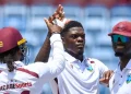 Alzarri Joseph (centre) impressed with 4-61 on day one in Grenada