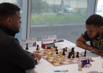 FM Joshua Johnson of Trinidad (L) facing FM Joshua Christie (Jamaica)