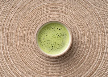 Regularly drinking green tea may help lower blood pressure.
MirageC / Getty Images