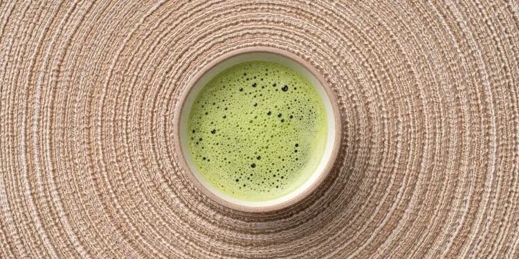 Regularly drinking green tea may help lower blood pressure.
MirageC / Getty Images
