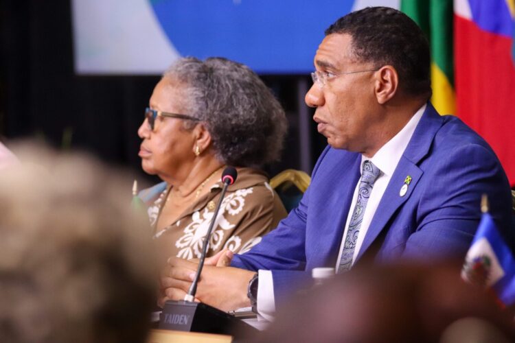 “I am on record as saying that we need to launch a war on gangs of a similar magnitude and nature to the war on terror.”
Dr the Most Honourable Andrew Holness, ON, PC, MP
Chair, CARICOM
Prime Minister, Jamaica
CARICOM Heads of Government have agreed to tackle the Region’s crime and security challenge with the adoption of the Montego Bay Declaration on Transnational Organised Crime and Gangs, underscoring leaders’ united stance against criminal networks.
This was highlighted by Dr the Most Honourable Andrew Holness, ON, PC, MP, CARICOM Chair and Jamaica’s Prime Minister, during the closing media conference for the 49th Regular Meeting of the Conference of CARICOM Heads of Government, which was held from 6-8 July in Montego Bay, Jamaica.
“A secure CARICOM is a viable CARICOM,” stated the CARICOM Chairman, “And as such, security remains high on the agenda for the duration of my chairmanship and beyond.”
Prime Minister Holness shared that leaders also held talks with the Secretary-General of the International Criminal Police Organization (INTERPOL), Valdecy Urquiza, who “committed to strengthening cooperation and expanding access to its global resources.”
In the Declaration, leaders reaffirmed their commitment to bolstering the Region’s efforts against organised crime by tracking emerging trends in illicit firearms trafficking, introducing strong legislation with tougher penalties for firearm and gang-related offences and enhancing public awareness to support prevention and prosecution initiatives.
Firm stance
During his keynote address at the Meeting’s opening ceremony on Sunday, the Prime Minister underscored that CARICOM nations must take a firm stance on organised criminal gangs, reiterating his position that gang violence must be regarded as acts of terrorism.
He stated that gang networks have grown well beyond typical street-level crime and now pose a serious threat to regional security and emphasised that addressing this issue requires the same level of urgency and coordinated action as the global fight against terrorism.
“I am on record as saying that we need to launch a war on gangs of a similar magnitude and nature to the war on terror,” the CARICOM Chairman stated.
Dr Holness underscored the urgent need for Member States to collaborate in dismantling the resources that fuel criminal organisations, particularly their access to financial systems.
Referencing a July 2024 United Nations report, Dr. Holness noted findings on the influence of gang activity in Jamaica, St. Lucia, Guyana, and Trinidad and Tobago. The report also highlighted a correlation between escalating drug production in South America, widespread firearm availability, and rising homicide rates.
Dr Holness further stated that the deteriorating security situation in Haiti serves as a stark warning and a call to immediate, coordinated regional action.
“It is the organisation of violence for profit. It is not merely street-level, dispossessed, socially excluded youngsters. There is a level of intelligence, a level of resources, a level of organisation that has been brought to crime and violence, which is being used for profit, stated the Prime Minister.
Adding, “My own view is that policy and jurisprudence need to evolve to address this matter.”
The Prime Minister underscored the immense scale and complexity of crime affecting the Region, cautioning that it cannot be resolved overnight or through short-term efforts.
He emphasised that a durable solution will require robust investment and widespread public engagement across the Community, noting that unified support is essential to effectively confront the threat.