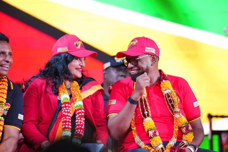 L-R ( in red) Minister Dr. Vindhya Persaud and President Irfaan Ali on the campaign trail