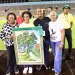 Sprint great Shelly-Ann Fraser-Pryce (second left) is joined by Minister of Sport Olivia Grange (left), JAAA president Garth Gayle (third left), and Wolmer’s High School for Girls principal Colleen Montague during a tribute following her third-place finish in the women’s 100m final at the Jamaica Trials on Friday, marking her final appearance at the national championships. She has already indicated that 2025 will be her final season. (PHOTO: Marlon Reid).