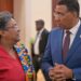 Barbados PM Mia Mottley converses with Jamaica's PM Andrew Holness at the CARICOM meeting in Montego Bay July 7, 2025