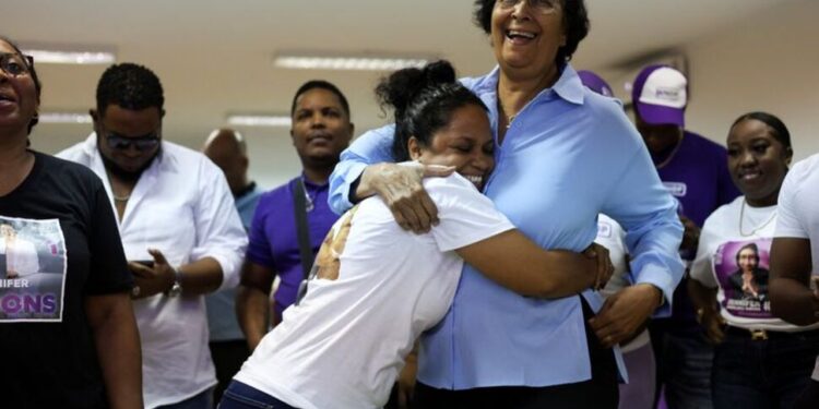 Newly elected President of Suriname Jennifer Geerlings-Simons surrounded by supporters
