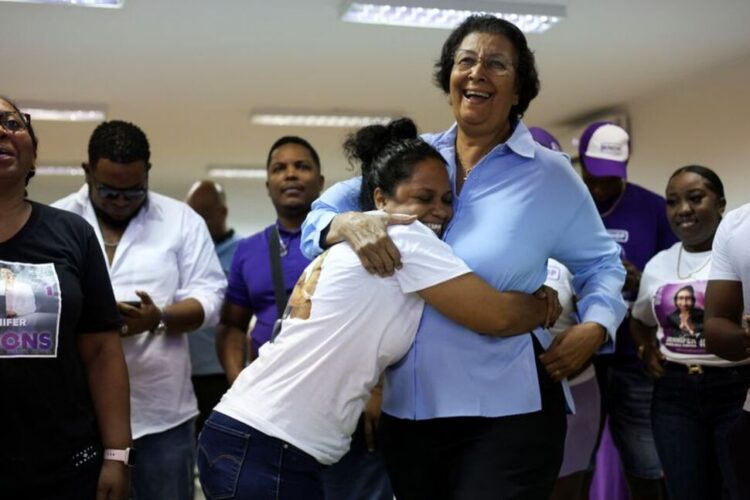 Newly elected President of Suriname Jennifer Geerlings-Simons surrounded by supporters