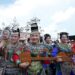 Cheerleading squad in ethnic costumes attend the restart ceremony of the "Village Super League" on July 26, 2025. (Photo by Long Jianrui/Xinhua)
