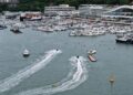 An aerial drone photo taken on Aug. 23, 2025 shows yachts returning to a dock in Sanya, south China's Hainan Province. (Xinhua/Zhao Yingquan)