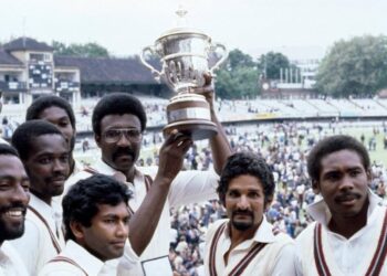 West Indies wicketkeeper Deryck Murray, second from right, with his West Indies teammates after winning the first Cricket World Cup in 1975 in London, England. West Indies captain Sir Clive Lloyd, third from right, holds the trophy.