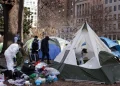 A tent encampment being removed from downtown Washington DC in 2023