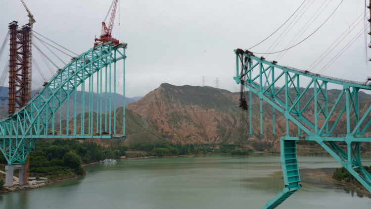 A photo taken on Aug 22, 2025 shows the site of the bridge under construction on the Qinghai section of the Sichuan-Qinghai Railway in Jainca county, Huangnan Tibetan autonomous prefecture. [Photo/Xinhua]