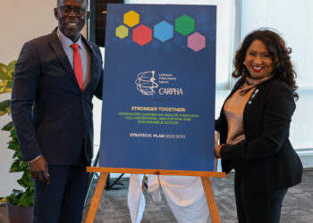 Dr. Armstrong Alexis, Deputy Secretary-General of CARICOM and Dr. Lisa Indar, ED, CARPHA during the unveiling at the Strategic Plan 2025-2030 Launch in Georgetown, Guyana