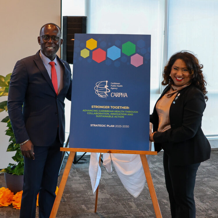 Dr. Armstrong Alexis, Deputy Secretary-General of CARICOM and Dr. Lisa Indar, ED, CARPHA during the unveiling at the Strategic Plan 2025-2030 Launch in Georgetown, Guyana