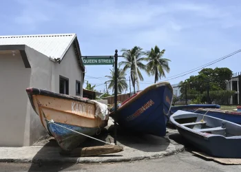 Fishing boat lie in the middle of the street for protection from Hurricane Beryl, Kingston JA. Collin Reid