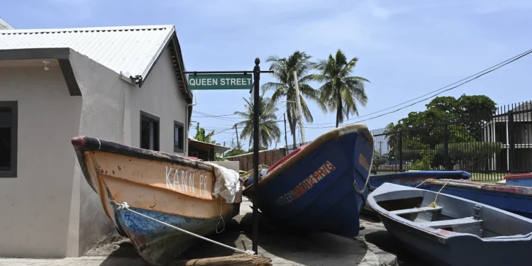 Fishing boat lie in the middle of the street for protection from Hurricane Beryl, Kingston JA. Collin Reid