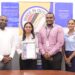 From left Invernisoft Inc. Managing Director Deon Thomas and Company Secretary Gigesha Thomas pose with GNBS Head of Certification Services (Ag.) Keon Rankin and GNB