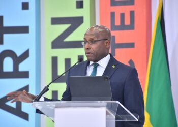 Photo: Serena Grant
Minister of Industry, Investment and Commerce, Senator the Hon. Aubyn Hill, addresses the opening ceremony of the Caribbean Investment Forum (CIF), at the Montego Bay Convention Centre in St. James, on Tuesday (July 29). The forum concludes on July 31.
