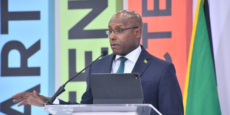 Photo: Serena Grant
Minister of Industry, Investment and Commerce, Senator the Hon. Aubyn Hill, addresses the opening ceremony of the Caribbean Investment Forum (CIF), at the Montego Bay Convention Centre in St. James, on Tuesday (July 29). The forum concludes on July 31.