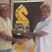 Kriskal Persaud receives his prize from FIDE Arbiter John Lee