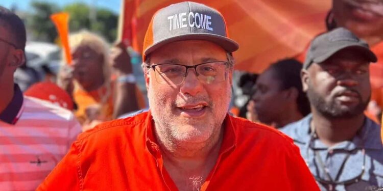 PNP President Mark Golding on his way to the nomination centre on Monday to confirm his candidacy.