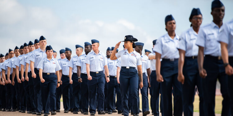 Airmen assigned to the 322nd Training Squadron graduate from basic military training at Joint Base San Antonio-Lackland, Texas, July 28, 2022. Lt. Gen. Richard W. Scobee, commander of Air Force Reserve Command, reviewed the ceremony. (U.S. Air Force photo by Miriam Thurber)