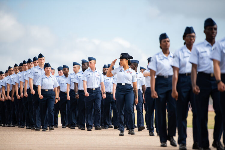Airmen assigned to the 322nd Training Squadron graduate from basic military training at Joint Base San Antonio-Lackland, Texas, July 28, 2022. Lt. Gen. Richard W. Scobee, commander of Air Force Reserve Command, reviewed the ceremony. (U.S. Air Force photo by Miriam Thurber)