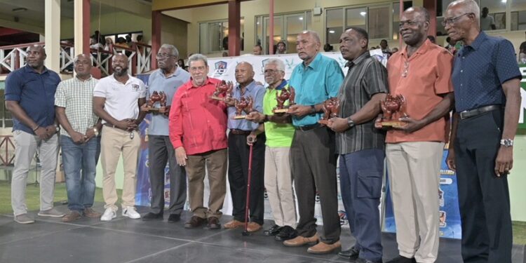 From left to right: Veteran West Indies cricketers Sir Clive Lloyd, Alvin Kallicharran, HE Deryck Murray, Sir Andy Roberts, Sir Gordon Greenidge and Collis King stand alongside the SVG prime minister, Ralph Gonsalves (in red). Photograph: Handout