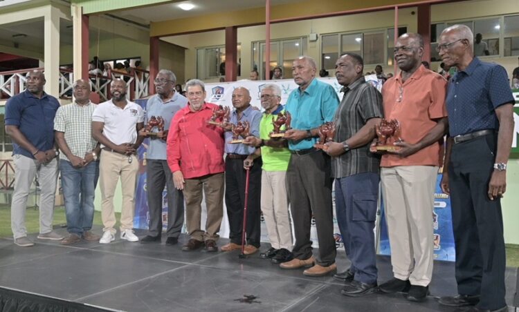 From left to right: Veteran West Indies cricketers Sir Clive Lloyd, Alvin Kallicharran, HE Deryck Murray, Sir Andy Roberts, Sir Gordon Greenidge and Collis King stand alongside the SVG prime minister, Ralph Gonsalves (in red). Photograph: Handout