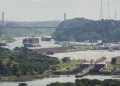 A cargo ship navigates through the Panama Canal, seen from the Cerro Ancon in Panama City, Tuesday, July 29, 2025. (AP Photo/Matias Delacroix)