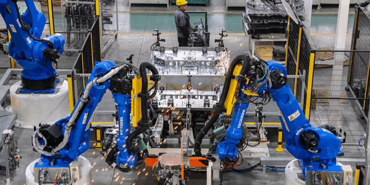 Industrial robots operate on the production line in a factory in Yangzhou, east China's Jiangsu Province, January 3, 2025. /VCG