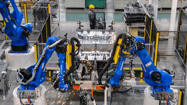 Industrial robots operate on the production line in a factory in Yangzhou, east China's Jiangsu Province, January 3, 2025. /VCG