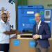 Hon. Dr. Frank Anthony, Minister of Health receives one of the solar refrigerators from Mr. Gabriel Vockel, UNICEF Representative of Guyana and Suriname