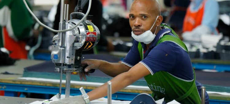 © ILO/Marcel Crozet A cutting operator works in a garment factory in Lesotho, a landlocked nation that plays a key role in supplying regional and continental markets with textiles, apparel and other goods.