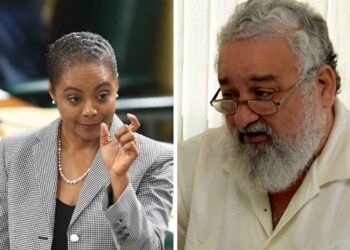 Minister of Legal and Constitutional Affairs Marlene Malahoo Forte and Gleaner columnist The Reverend Peter Espeut (Gleaner Photo)